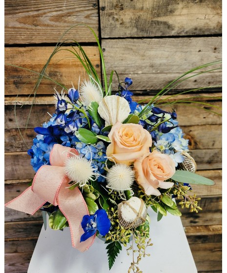 peach and blue floral arrangement