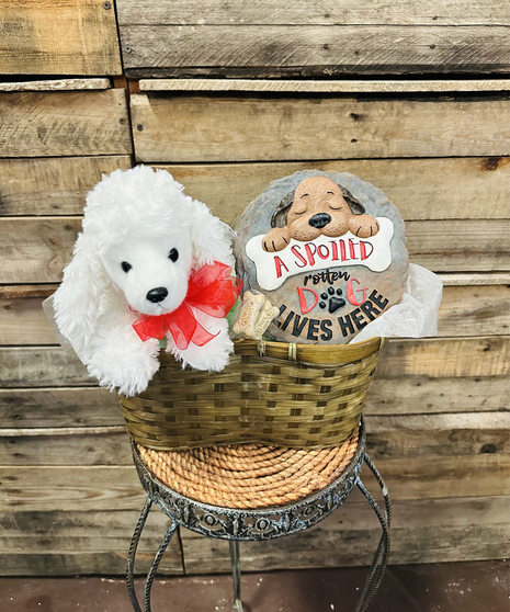 gift basket with garden stone and stuffed dog