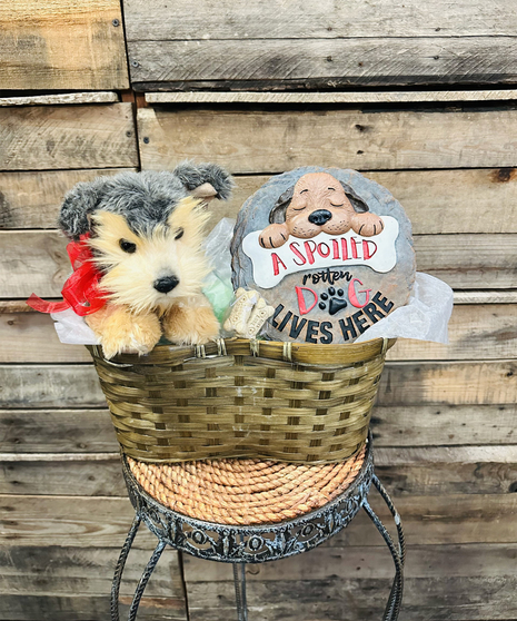 gift basket with garden stone and stuffed dog